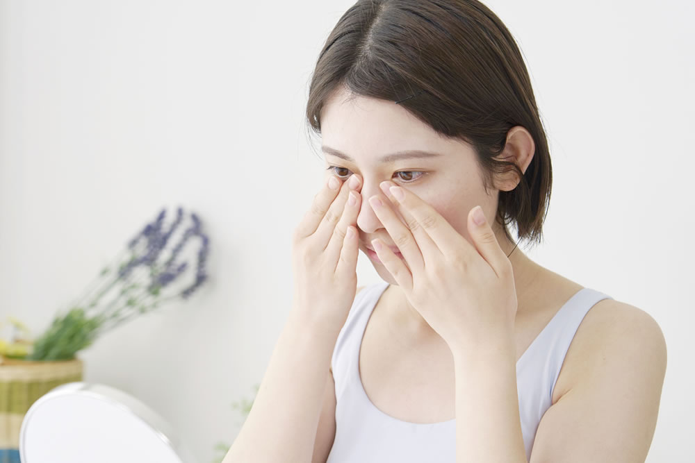 埋没法をしている20代の女性のイメージ